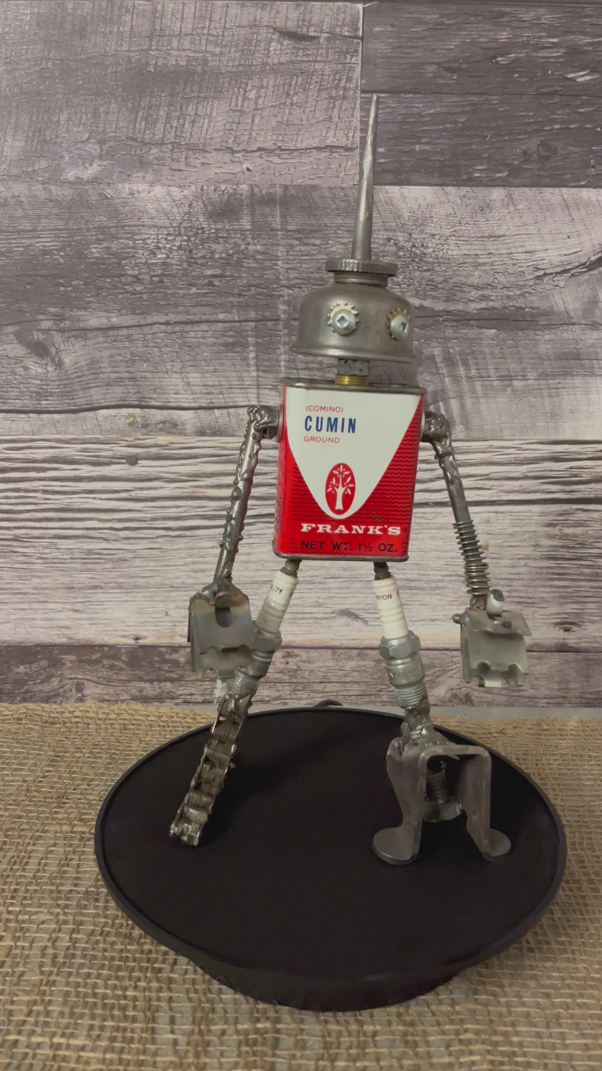 Meet Comino!  This one-of-a-kind robot scrap art sculpture is made from a vintage cumin (comino) spice tin body, a vintage oiler head, scrap metal arms, spark plug thighs with scrap metal legs and feet. Spice up any shelf in your home or office with this spicy robot sculpture.  
