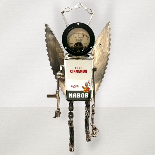 Meet Angel!  This one-of-a-kind robot scrap art sculpture is made from a vintage cinnamon tin body, vintage gauge head with uniquely reimagined scrap metal arms made from vintage Singer sewing machine parts, chain legs and saw blade wings.  Your very own guardian angel robot! See video for a 360-degree view! Features:  •	Height: 35 cm or 13.75 inches tall  •	Width: approximately 18 cm or 7 inches wide •	Weight: 1.17934 kg or 2.6 lbs.