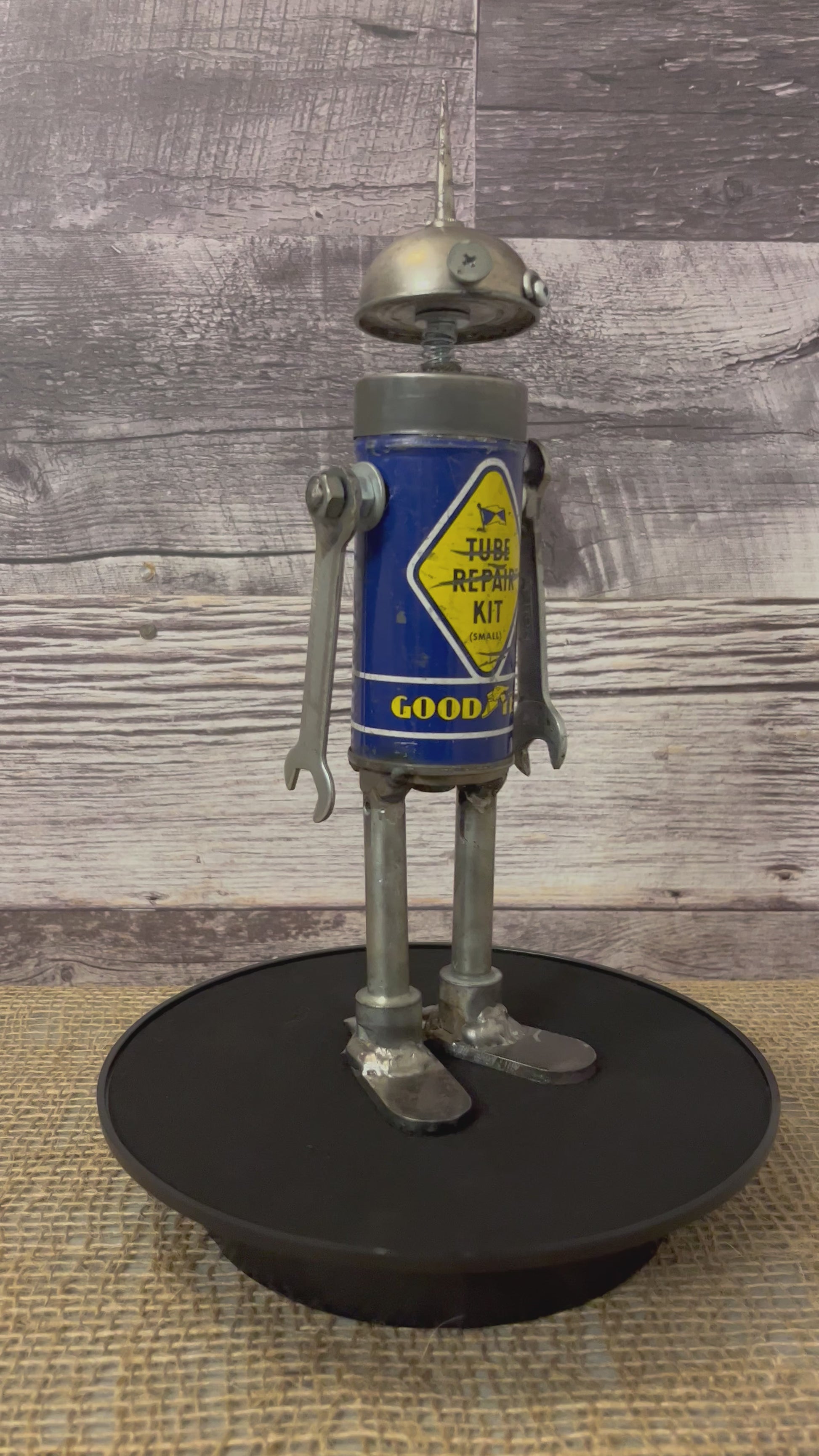 Meet Tubie! This one-of-a-kind robot scrap art sculpture is made from a vintage bicycle tube repair kit tin body, a vintage mini oiler head with uniquely reimagined scrap metal arms and legs. This little bot is a real cutie!   See video for 360 degree view!  Features:   Height: 29 cm or 11.5 inches tall Width: approximately 8 cm or 3.25 inches wide Weight: 0.635029 kg or 1.4 lbs